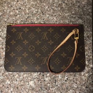 Louis Vuitton “Never Full” wristlet